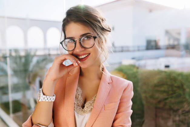 beautiful girl with makeup and glasses