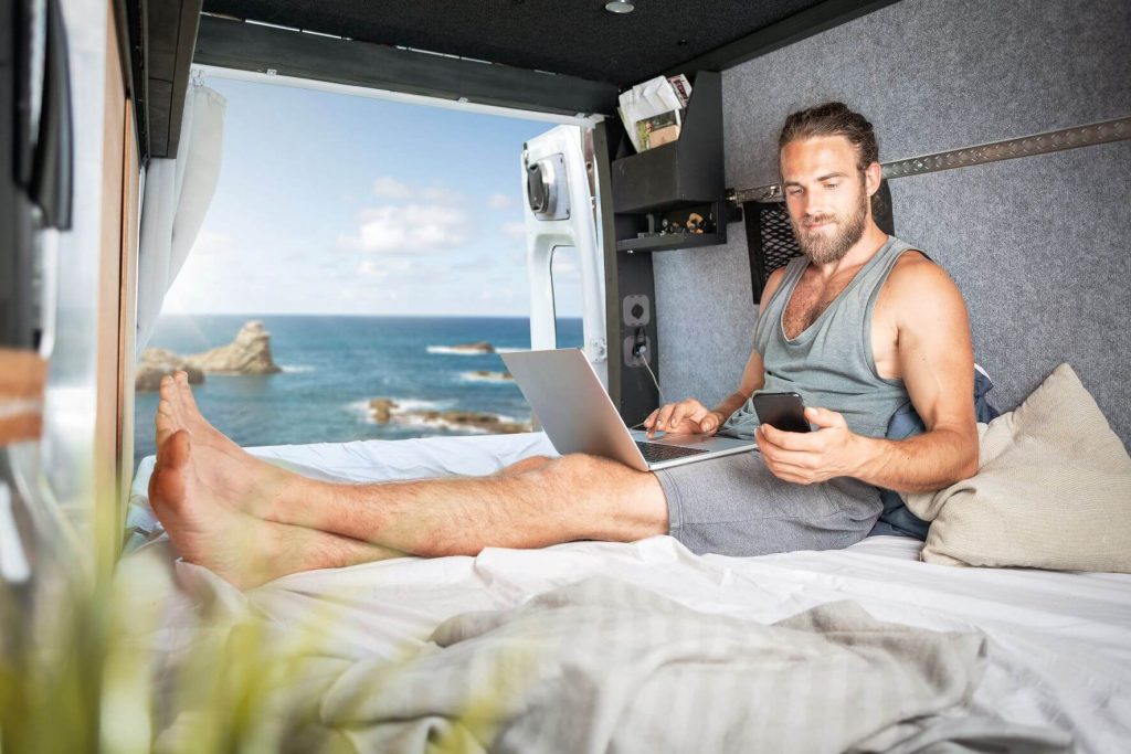 a digital nomad working out of a van
