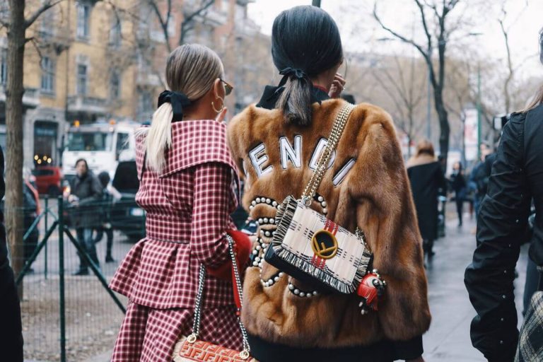 woman wearing fendi branded coat
